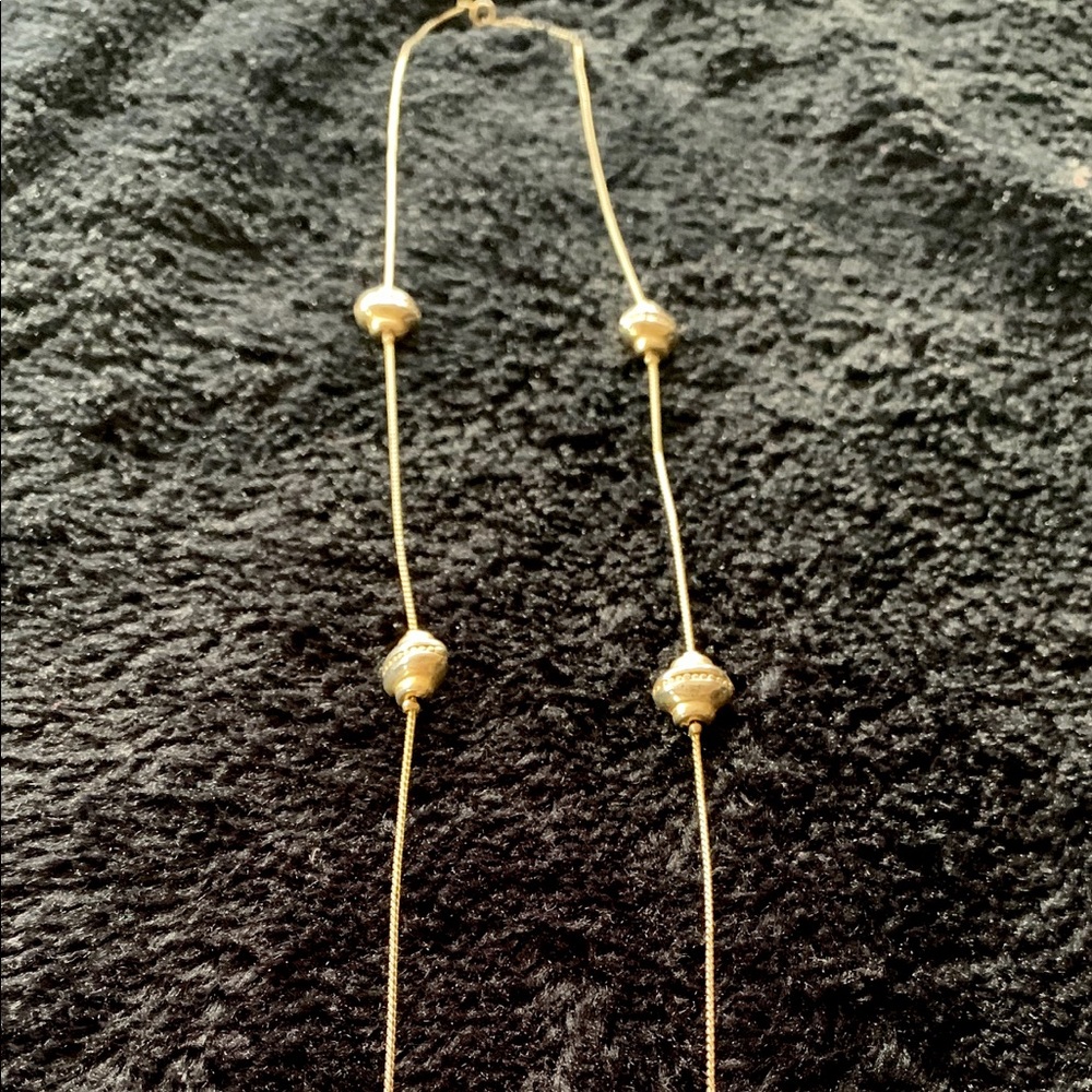 Gold long thin necklace